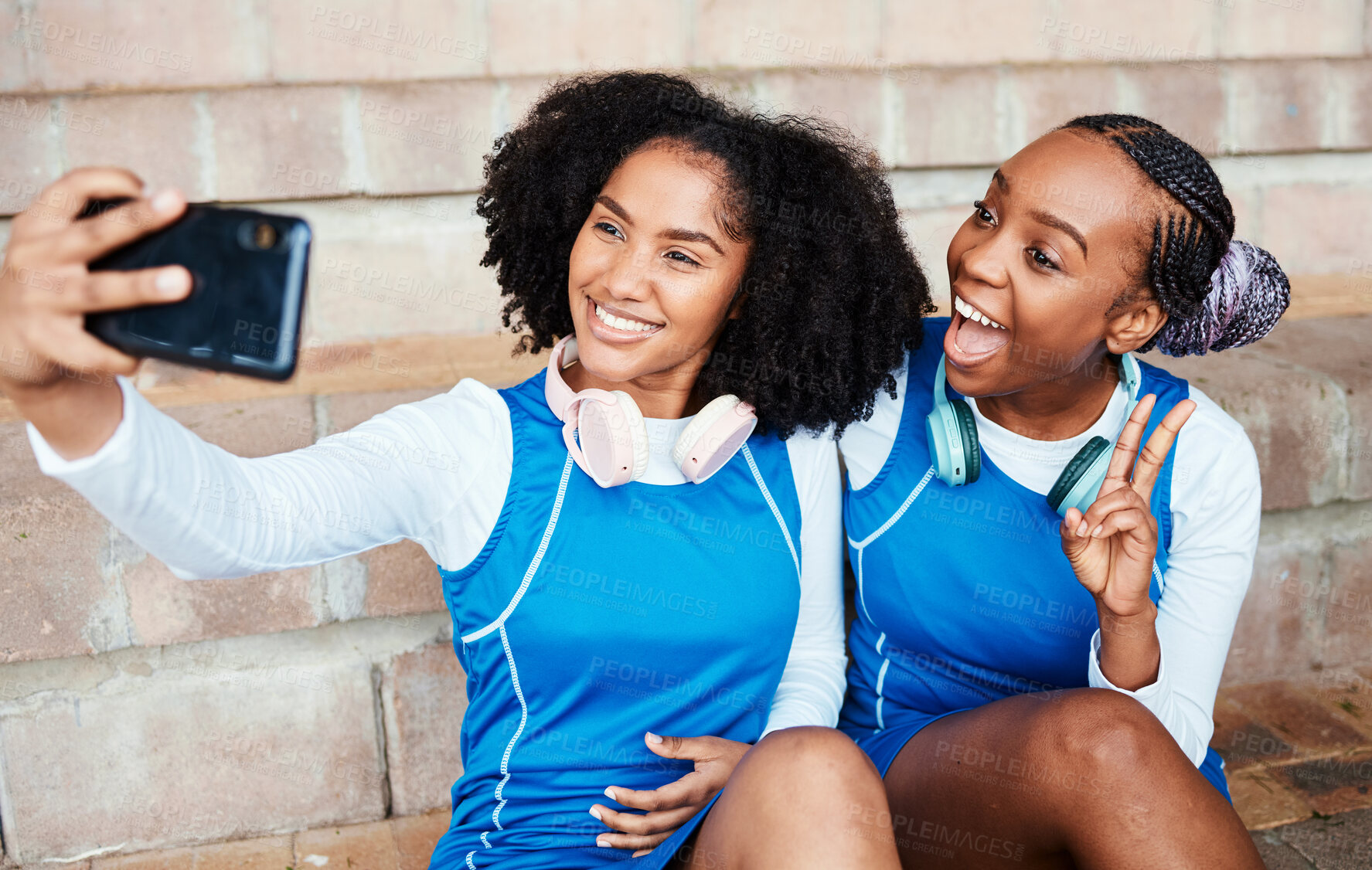 Buy stock photo Netball selfie, sports women or team on break with social media post, happy training update and relax on floor. Athlete black people, teenager or gen z friends in profile picture and peace emoji hand