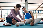 First aid, injury and man with leg pain in gym after accident, workout or exercise. Fitness health, physiotherapist woman or male gymnast or athlete with fibromyalgia, inflammation or painful muscles