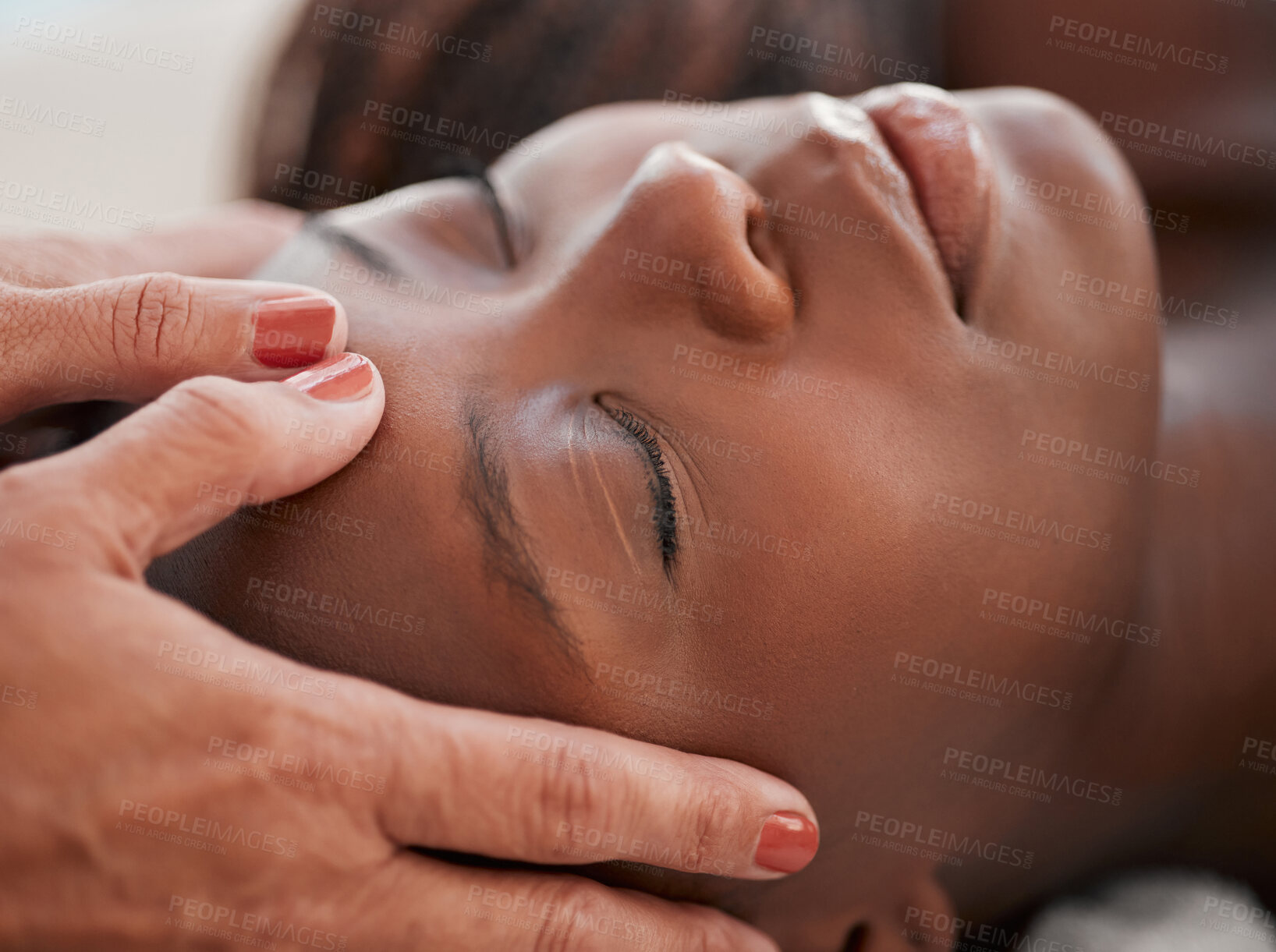 Buy stock photo Skincare, beauty and black woman getting a facial massage for health, wellness and self care. Cosmetic, spa and calm African female sleeping while doing a luxury natural face treatment at a salon.