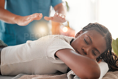 Buy stock photo Relax, reiki energy and black woman on bed at spa for chakra therapy and light holistic medicine. Spiritual healing, balance and zen, person with peaceful and healthy mindset at traditional massage.