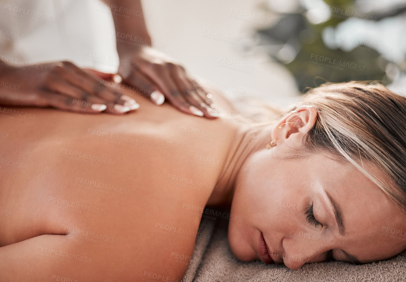 Buy stock photo Hands, back massage with masseuse, woman at holistic center or spa with wellness, physical therapy and zen. Health, body rub at luxury resort and face with stress relief, self care and lifestyle