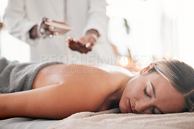 Buy stock photo Spa, oil and woman on a table for massage, wellness and skin treatment for peace, zen and relax. Luxury, girl and masseuse with skin product for massaging, therapy and healing in a beauty salon