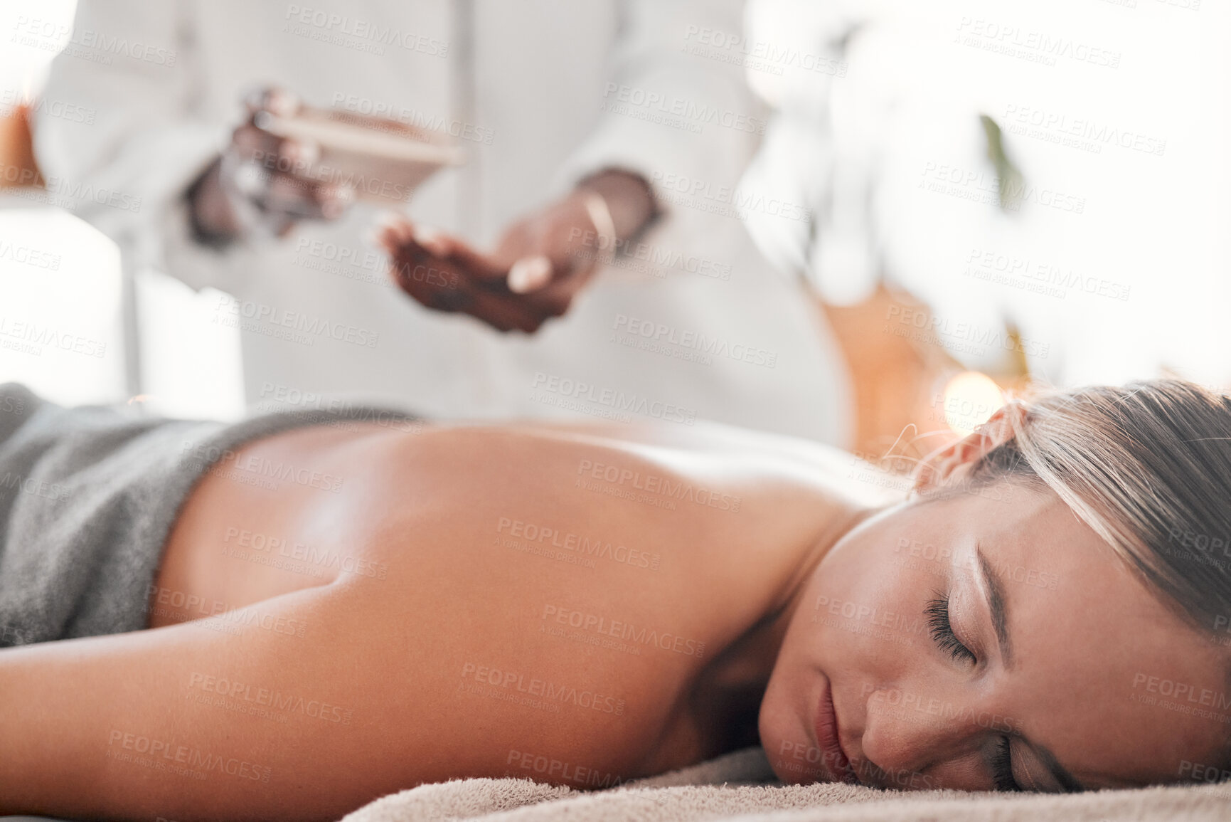 Buy stock photo Woman, spa and luxury back massage on table for health, zen and wellness of body. Client with a masseuse for healing, relax and therapy with self care and cosmetic service for detox and holistic time