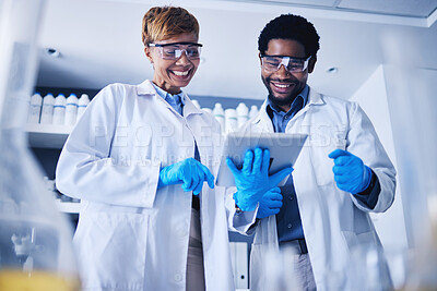 Buy stock photo Tablet, science and collaboration with a team working on research in a lab together for innovation or growth. Doctor, teamwork or medical with a black man and woman scientist at work in a laboratory