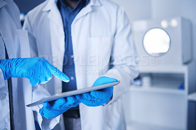 Buy stock photo Tablet, research and hands with a team working on science in a lab together for innovation or growth. Doctor, teamwork or medical with a black man and woman scientist at work in a laboratory