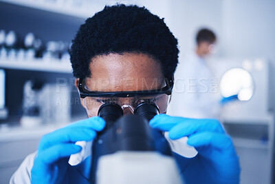 Buy stock photo Microscope, science and black man face working in laboratory, medical research or virus analysis. Scientist, microbiology or medical worker check investigation, study innovation or dna pathology test