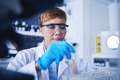 Buy stock photo Science, test tube and black woman in laboratory for research, medical study and lab experiment. Healthcare, pharmaceutical and female scientist with liquid sample, medicine and vaccine development