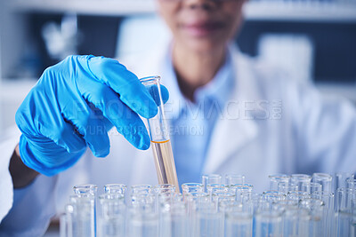 Buy stock photo Science, research and hand with test tube, woman in laboratory with solution for vaccine and medical innovation. Healthcare, lab analytics and medicine, female scientist holding pharmaceutical sample