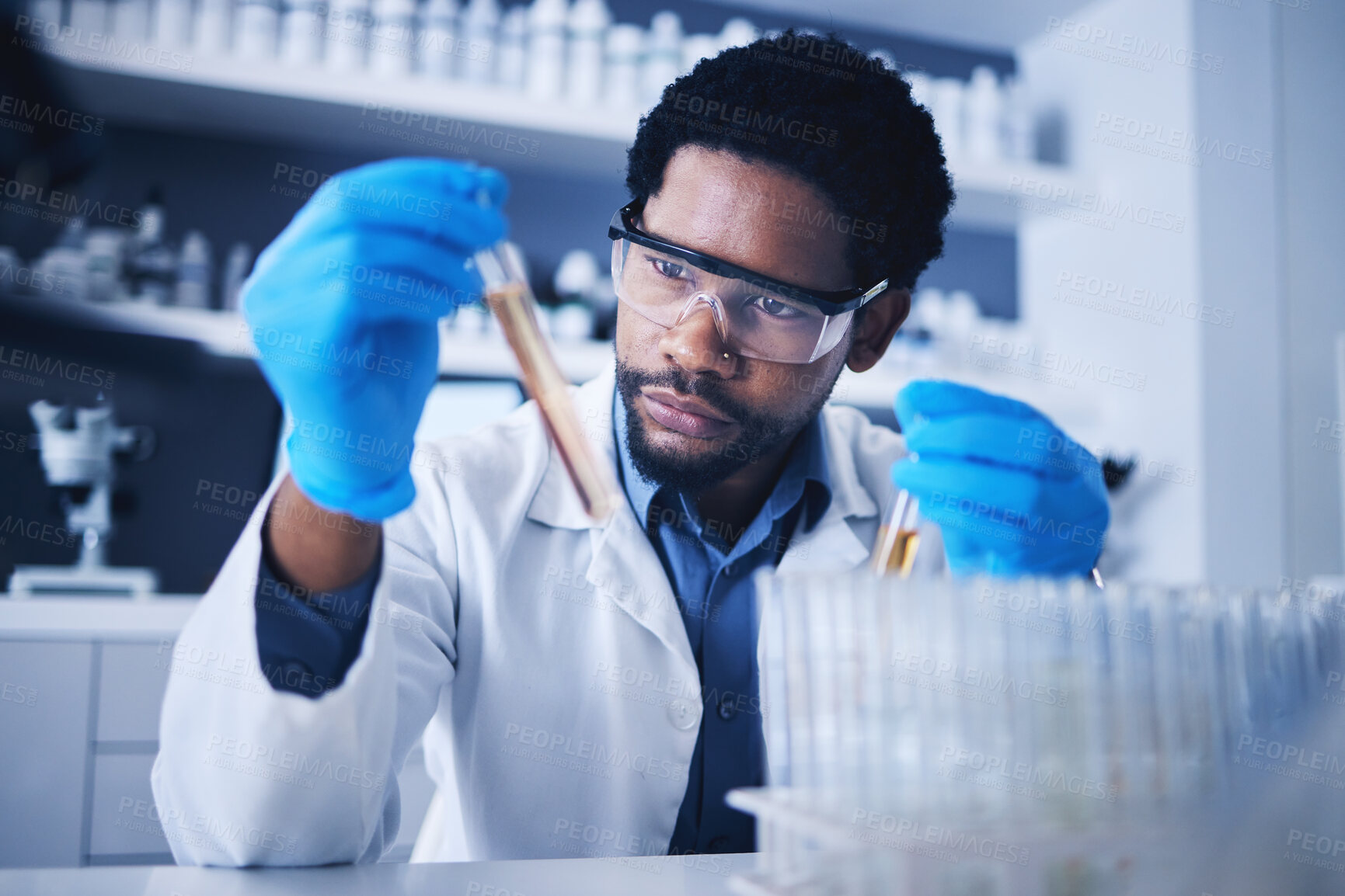 Buy stock photo Science, test tube and black man in laboratory with liquid for research, medical exam and sample analysis. Healthcare, biotechnology and male scientist thinking with liquid vial, medicine and vaccine