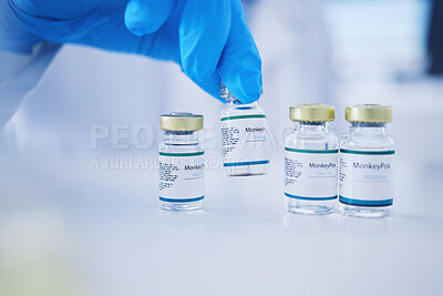 Buy stock photo Monkeypox vaccine, hands and virus vials for safety, healthcare medicine and immunity in laboratory. Closeup vaccination, liquid bottle and drugs for protection, medical wellness and pharma research