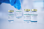 Vaccine, doctor hands and monkeypox vial for safety, healthcare medicine and pharmaceutical laboratory test. Closeup vaccination, liquid bottle and drugs for virus risk, medical wellness and research