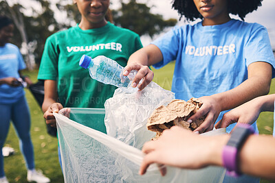 Buy stock photo Recycle, plastic bag and ngo volunteer group cleaning outdoor park for sustainability. Nonprofit, recycling project and waste clean up in nature for earth day, climate change and community support