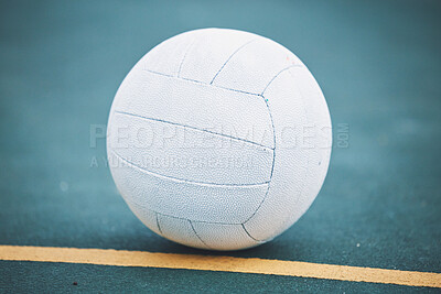 Buy stock photo Netball on the floor on a sport court for a game, training or exercise outdoor on a field. Sports, fitness and white ball on the ground for a match, workout or practice competition by a outside arena