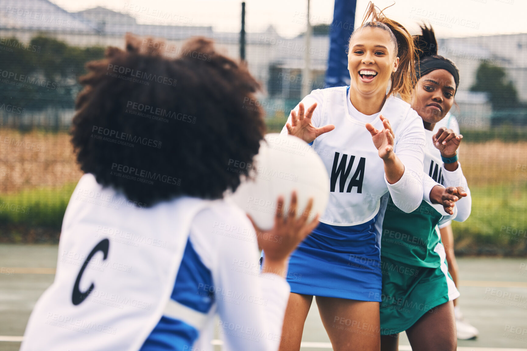 Buy stock photo Netball, sport and women in a match or game being competitive in a competition on a court as teammates. Training, fitness and female athletes happy for high school sports and exercise as a team