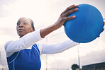 Fitness, black woman and netball for exercise, training and playing for game, competition and balance. African American female athlete, healthy lady or player with ball, outdoor or practice for match