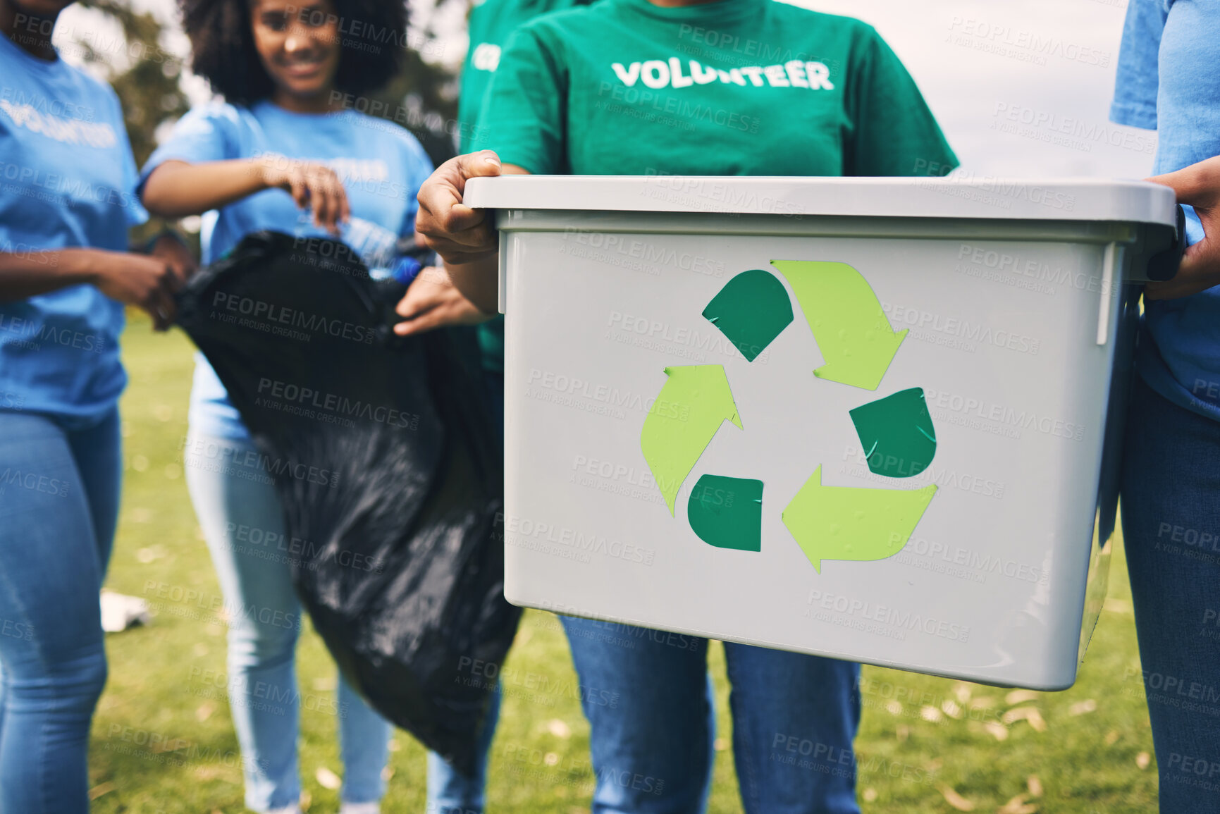 Buy stock photo Recycle bin, volunteer service and community park cleaning outdoor for sustainability. Working, earth day recycling and trash collection of young people doing green ecology job and charity work
