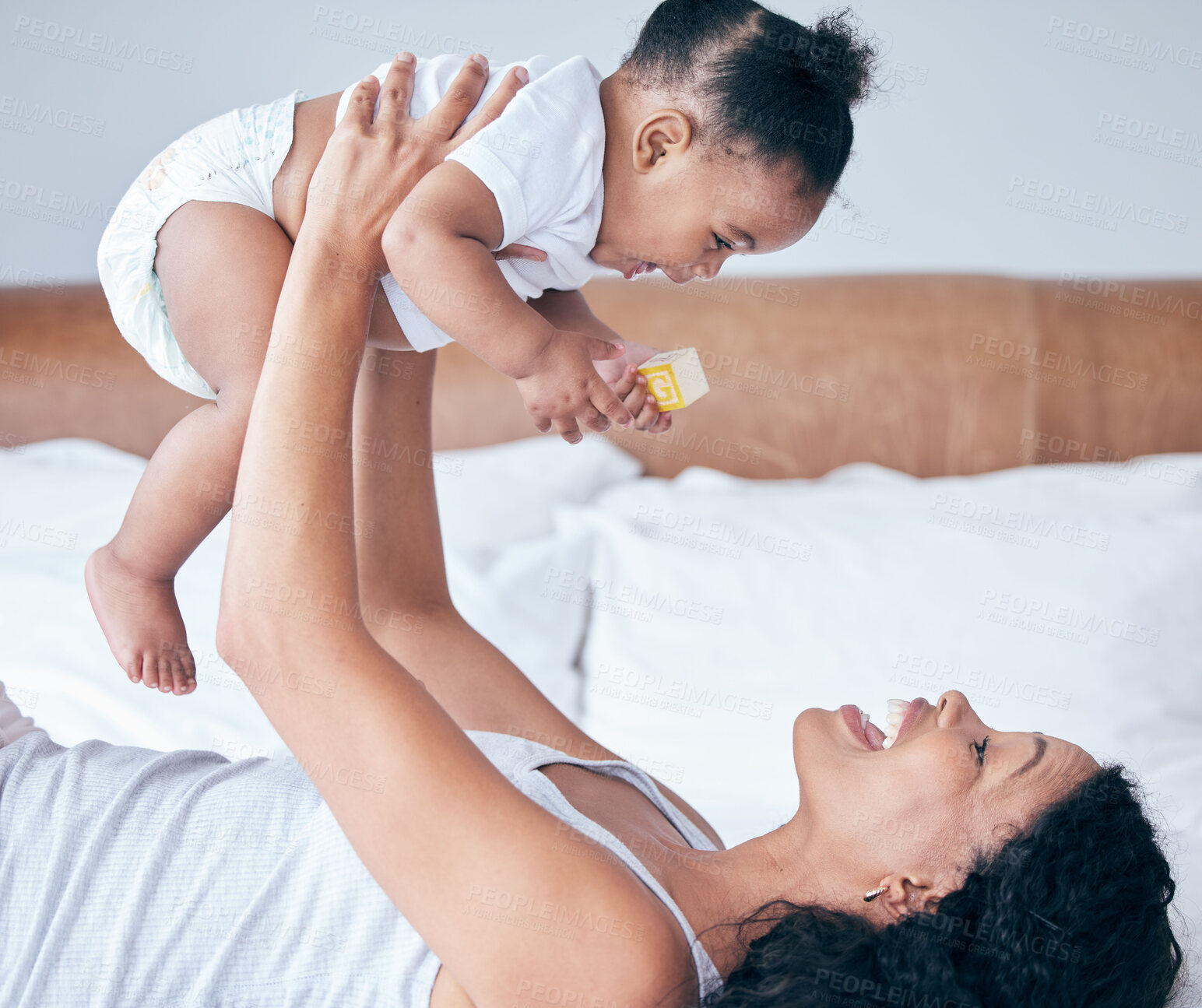 Buy stock photo Happy mom, bedroom and baby in the air with parent care and love at home in morning, Child, mother and happiness of a young mama with a kid playing and having fun together in a house with childcare