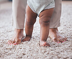 Baby feet, youth walking and kid learning with mother in living room lounge with mobility development. Floor, home and first steps of a young child with mama love, care and support in a house