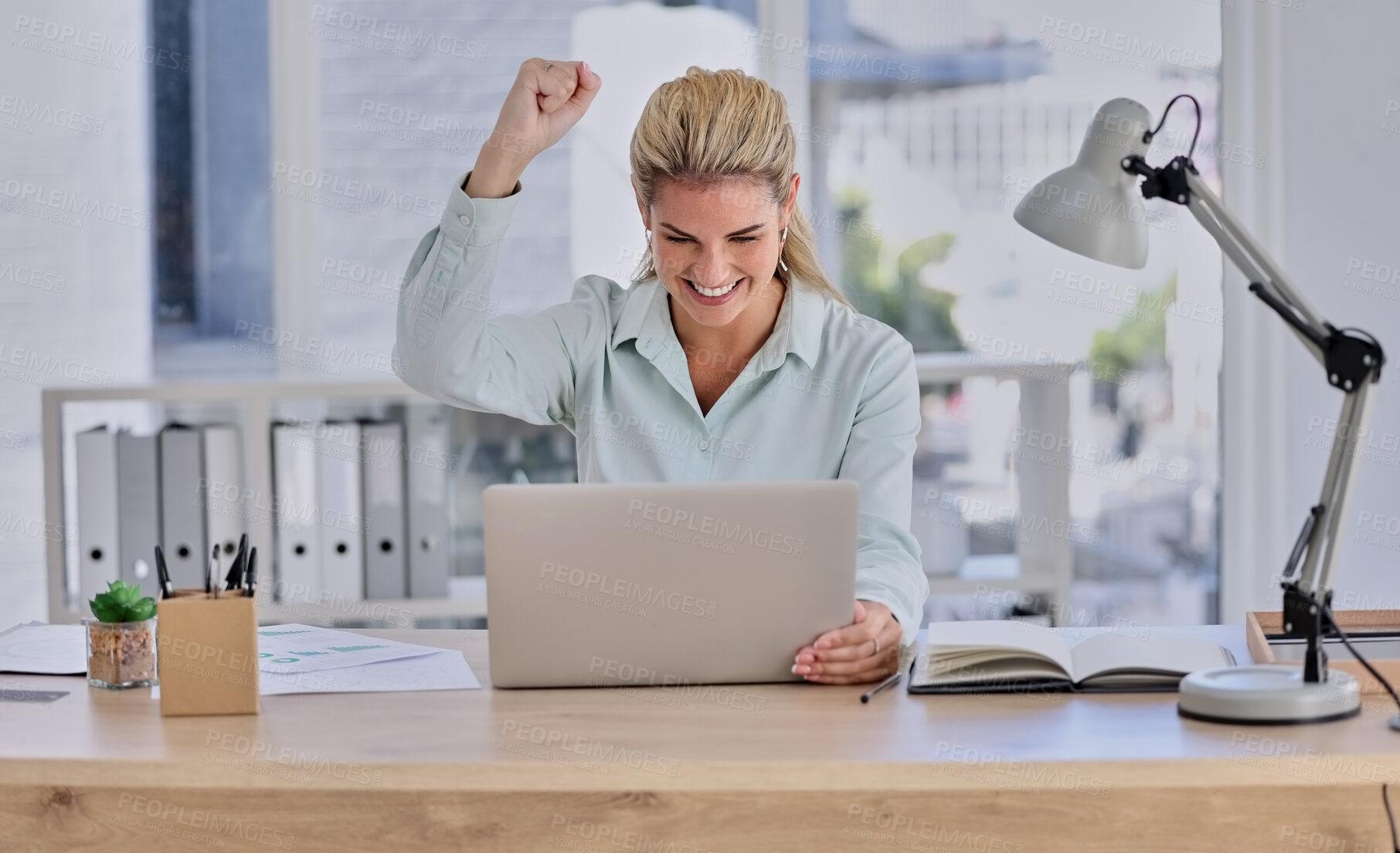 Buy stock photo Woman, laptop and celebration for winning, promotion or reading good news at office desk. Happy female winner by computer raising fist and celebrating win, discount or sale for victory or achievement