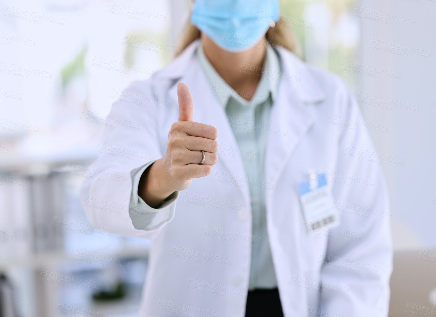 Buy stock photo Woman, doctor and hands in thumbs up for good job, success or winning with mask at the hospital. Hand of female medical professional showing thumb emoji, yes sign or like for life insurance at clinic