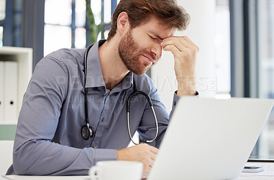 Headache, stress or man doctor on laptop in hospital feeling pain, burnout or migraine working in office. Medicine, anxiety or medical physician on tech for mental health, depression or surgery fail