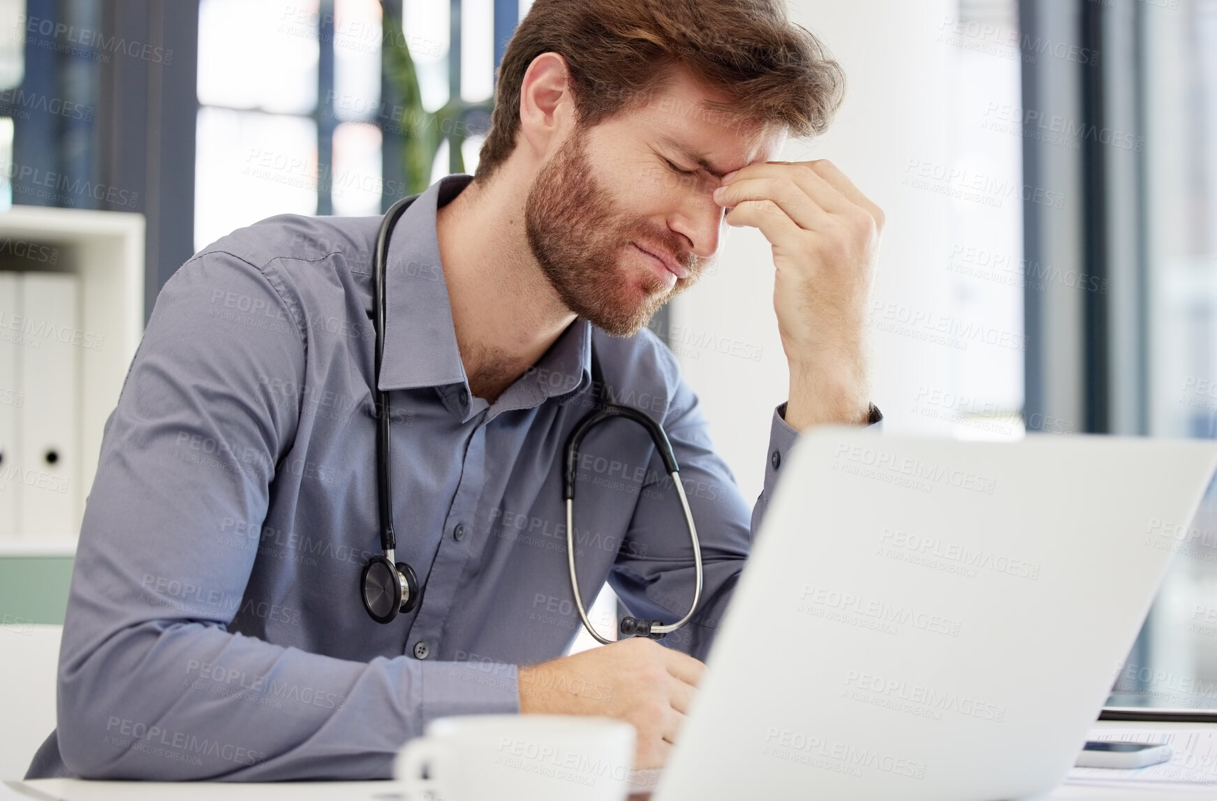 Buy stock photo Headache, stress or man doctor on laptop in hospital feeling pain, burnout or migraine working in office. Medicine, anxiety or medical physician on tech for mental health, depression or surgery fail 
