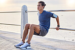 Fitness, stretching and man at a beach for training, exercise and running at sunset, serious and focus. Mindset, stretch and workout for mexican guy at ocean, competitive and concentration before run