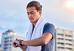 Fitness, smartwatch and man checking running, health and cardio progress while training in a city. Digital, heart and pulse tracker for guy runner outdoor for performance, monitor and exercise app