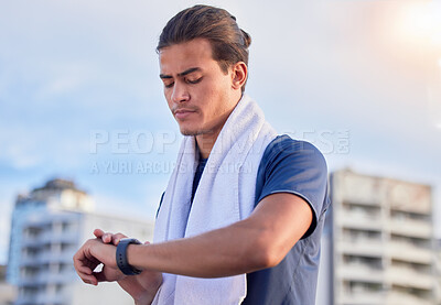 Buy stock photo Fitness, smartwatch and man checking running, health and cardio progress while training in a city. Digital, heart and pulse tracker for guy runner outdoor for performance, monitor and exercise app