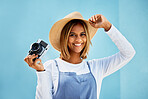Happy, camera and photographer with portrait of woman for creative, retro and shooting photos. Fashion, happiness and vintage with girl and photography for picture, lens and focus in wall background