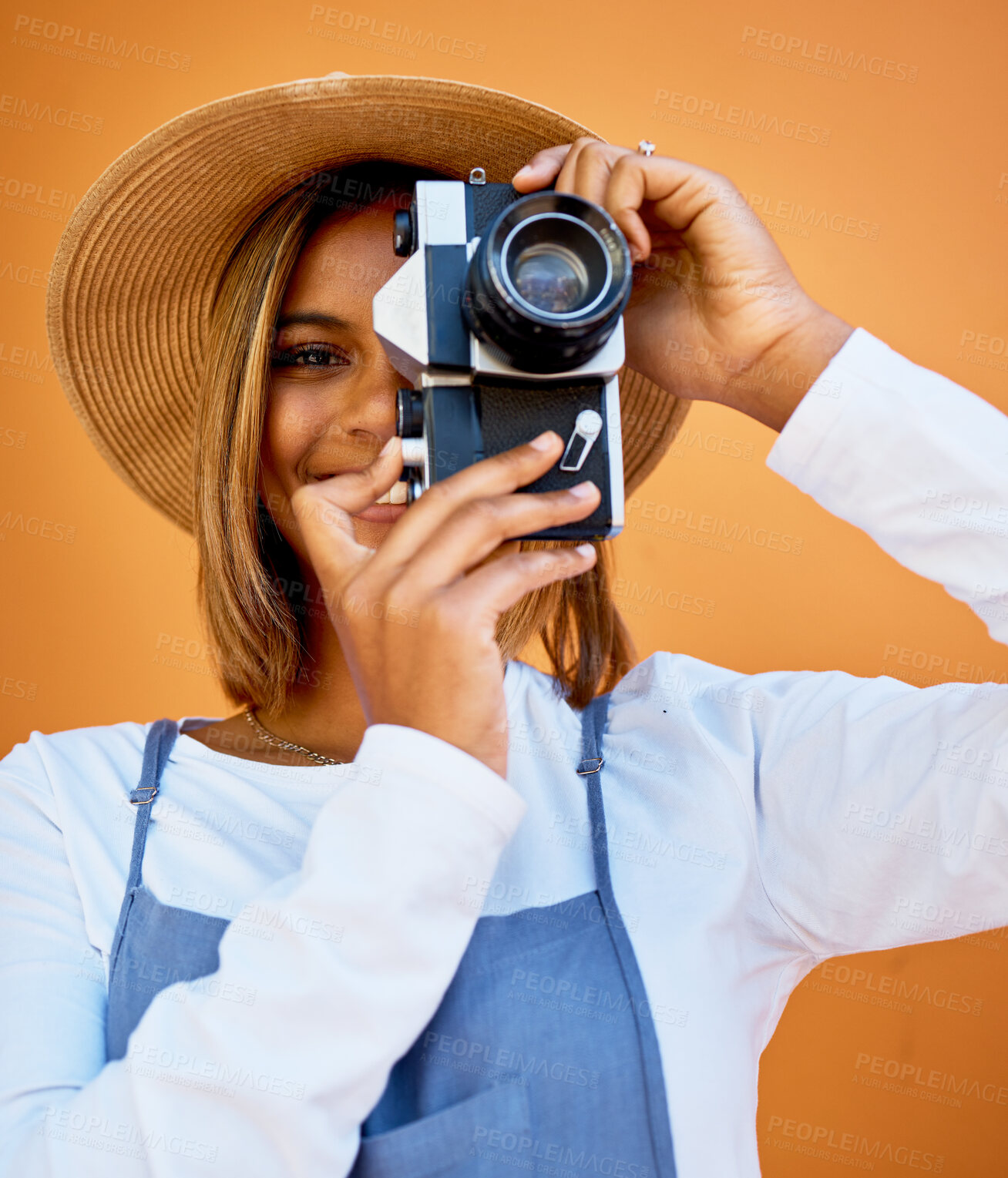 Buy stock photo Camera, portrait and photographer woman isolated on wall background for summer beauty, holiday travel and fashion. Gen z, black person or model face with retro photography for vacation digital memory