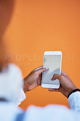 Buy stock photo Mockup, communication and woman with blank phone screen for marketing, branding and connection. Social media, design and girl typing on an empty mobile for an app, advertising and space on a backdrop