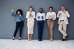 Business people standing in line with technology isolated on wall background for communication and career opportunity. waiting room, diversity and corporate employees on smartphone, laptop and tablet