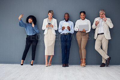 Buy stock photo Business people standing in line with technology isolated on wall background for communication and career opportunity. waiting room, diversity and corporate employees on smartphone, laptop and tablet