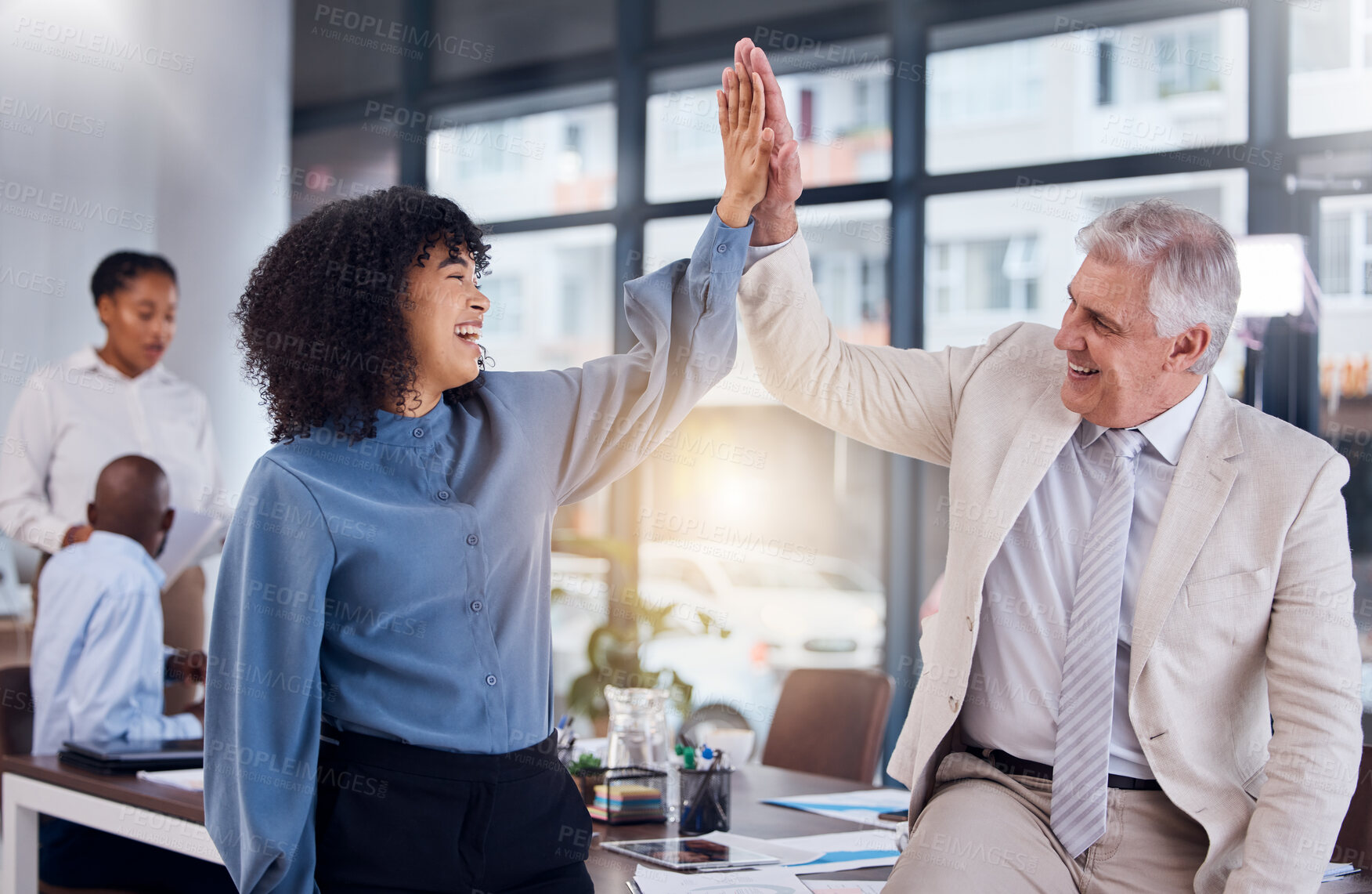 Buy stock photo Business people, high five and celebration for success, collaboration or teamwork at the office. Happy black woman touching hand of senior man CEO celebrating team strategy, management or leadership