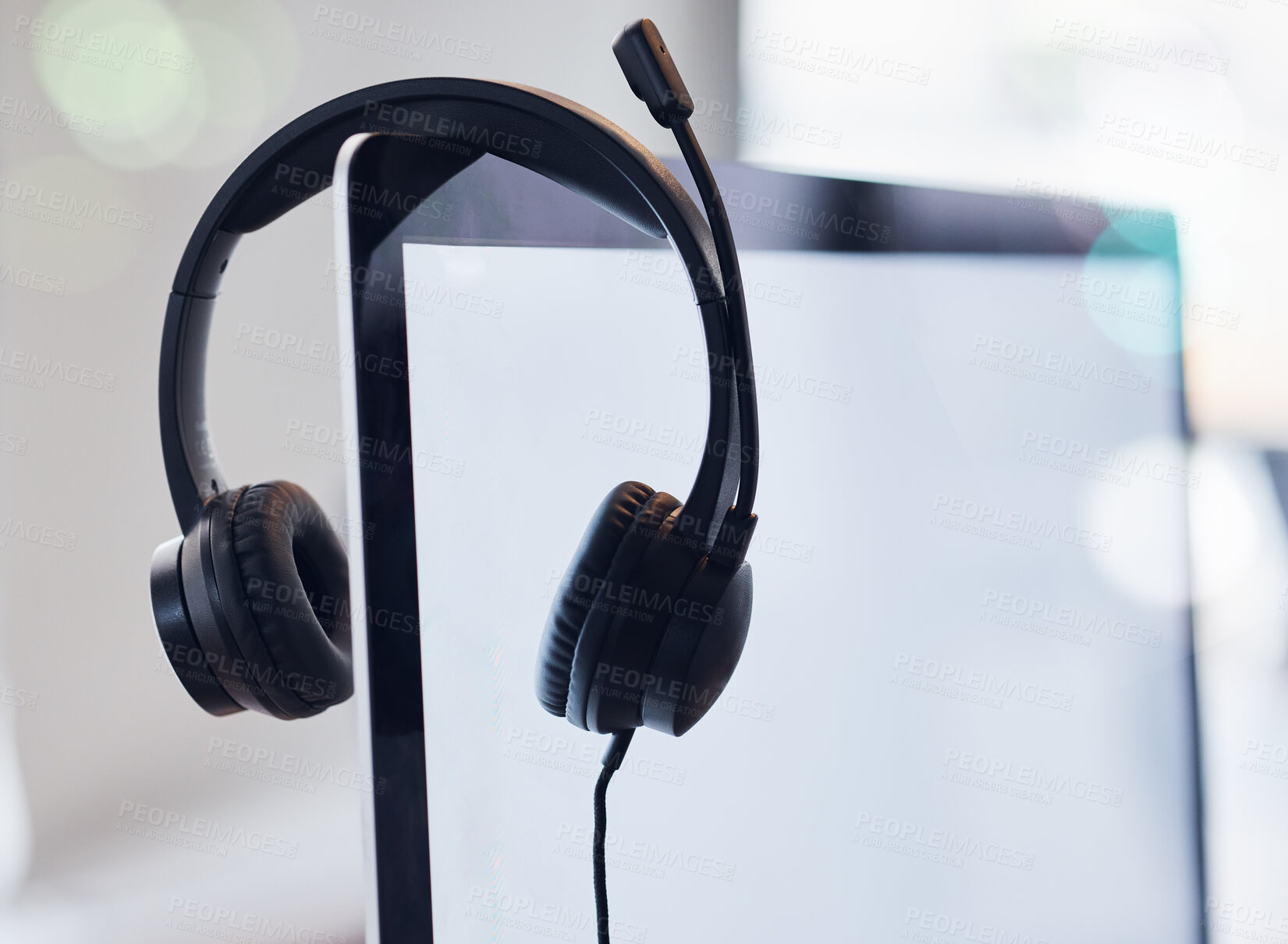 Buy stock photo Headset, computer and mockup screen in call center for desktop support, communication or telemarketing at office. Headphones, equipment or contact us technology and tools on monitor display at work