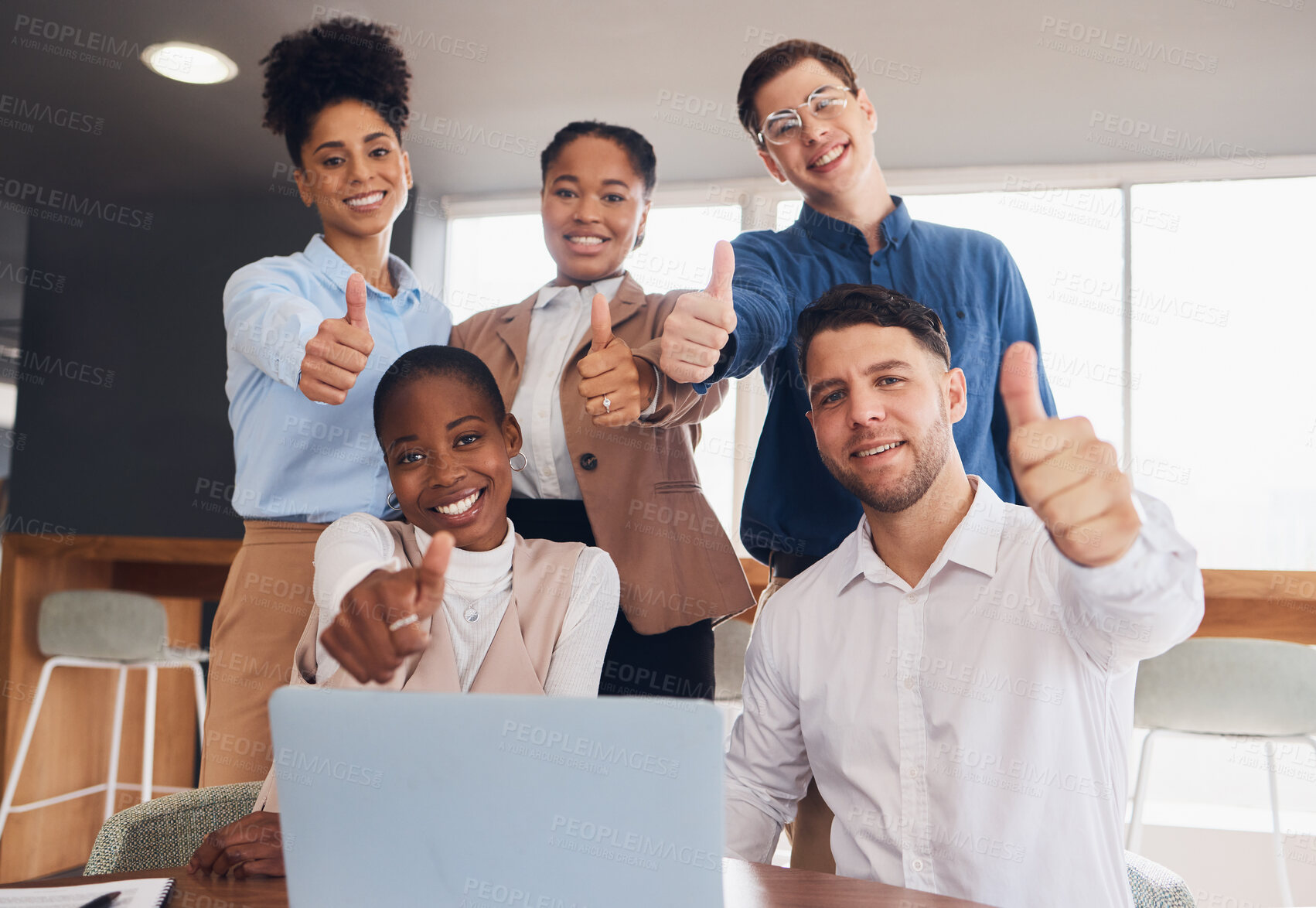 Buy stock photo Business people, laptop and team thumbs up for success, good job or teamwork planning in meeting at office. Group of creative employees by computer showing thumb emoji, yes sign or like for startup