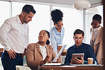 Business people, tablet and brainstorming meeting in collaboration for marketing idea, planning or strategy at office. Group of creative employees discussing project plan in teamwork for startup