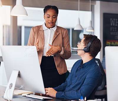 Buy stock photo Training, help and manager with a call center employee for advice on online telemarketing support. Planning, conversation and black woman speaking to a customer service agent about consulting service