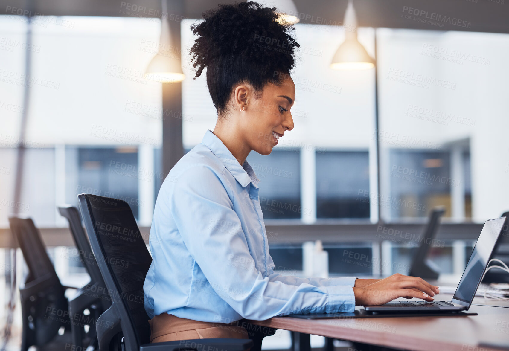 Buy stock photo Laptop, flare and review with a business black woman typing an email or report while sitting in the office boardroom. Computer, internet and networking with a female employee working on an appraisal