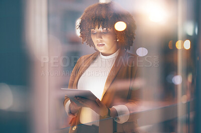 Buy stock photo Tablet, night and black woman for online research, internet networking or business planning in window bokeh. Serious professional worker, employee or person typing or analysis on digital technology