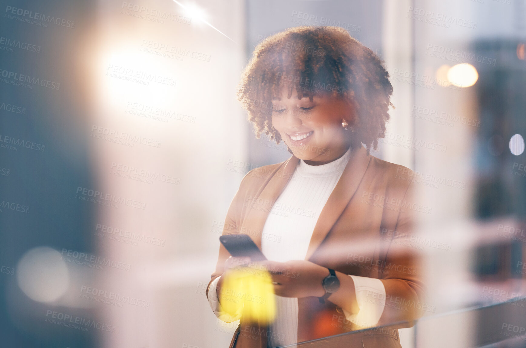 Buy stock photo Happy, social media and black woman typing on a phone for communication, chat and connection. Smile, internet and African employee reading a message, email or text on a mobile app from a window