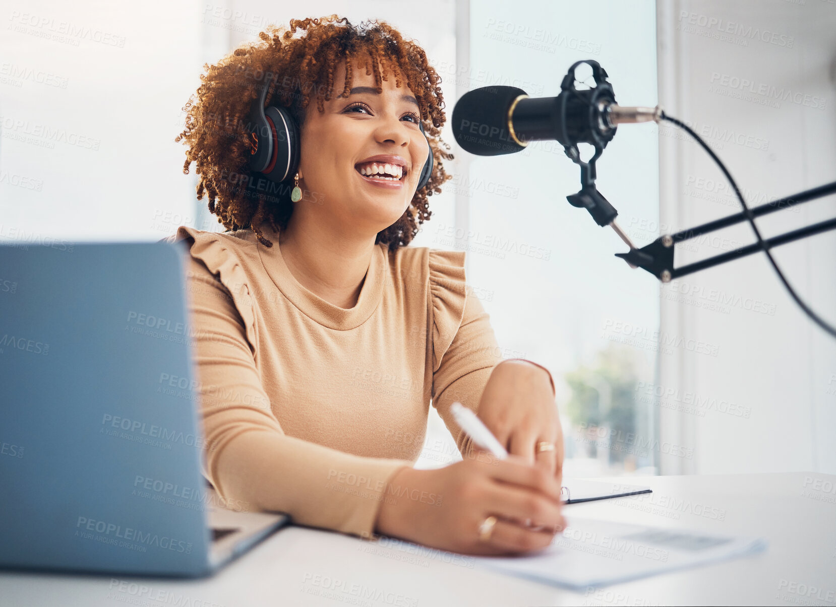 Buy stock photo Laptop, microphone and radio with a black woman presenter talking during a broadcast while live streaming. Influencer, talk show and media with a female journalist or host chatting on a mic