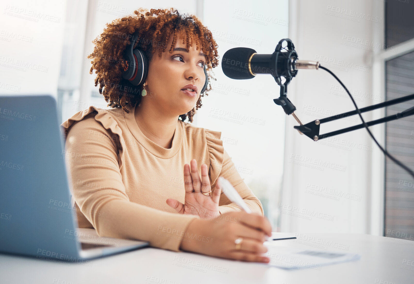 Buy stock photo Podcast, microphone and black woman radio broadcast, content creation or recording virtual interview on laptop. Young reporter, news person or journalist speaking, planning live streaming audio show