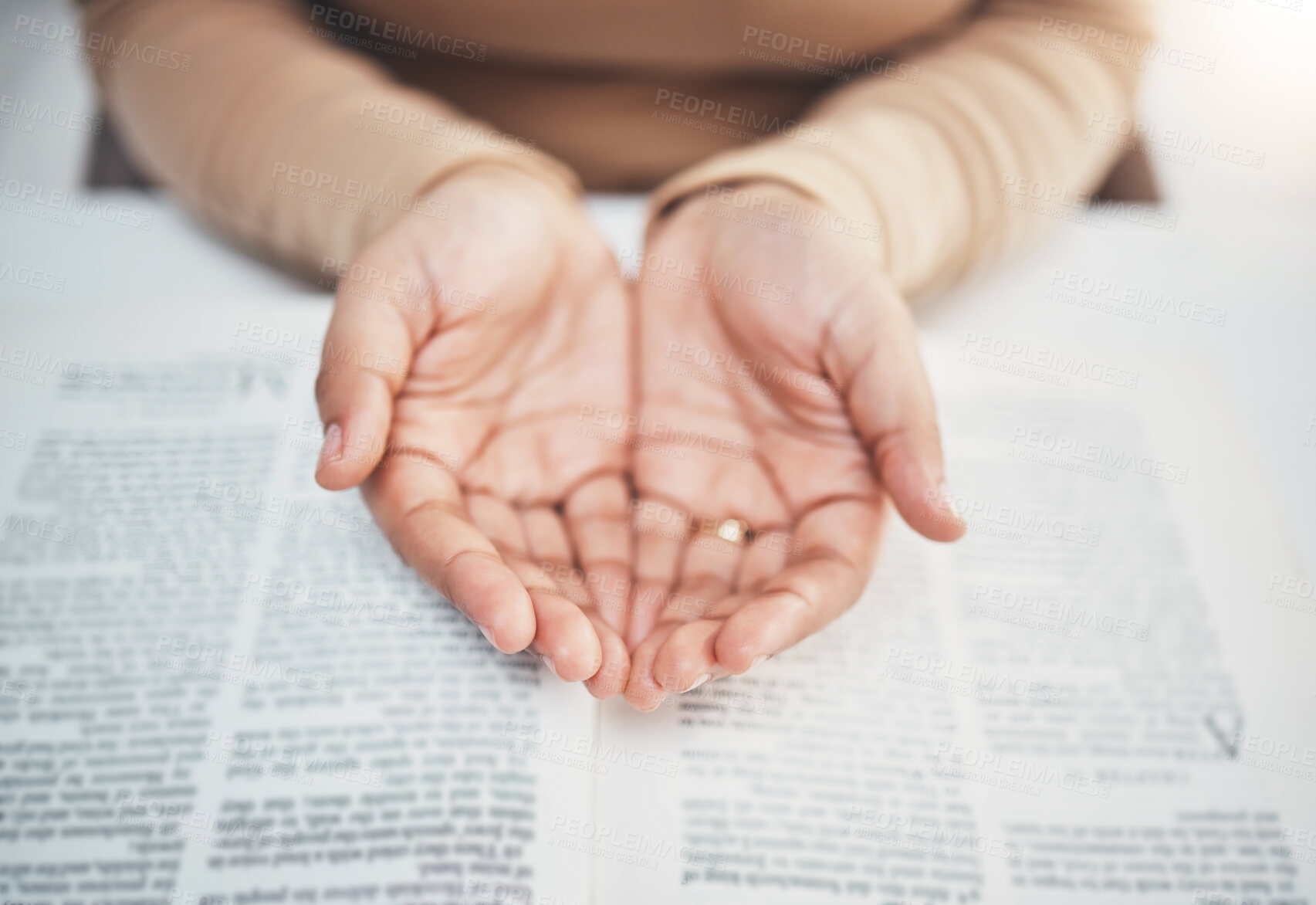 Buy stock photo Faith, prayer and bible with hands of woman for religion, support and Christian worship. Believe, spirituality and God with girl praying over catholic holy text for wellness, respect and hope 