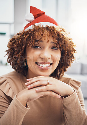 Buy stock photo Santa hat, black woman and portrait of a female at home getting ready for christmas and holiday. House, smile and happiness of a young person celebrating holidays in an apartment with fun accessories