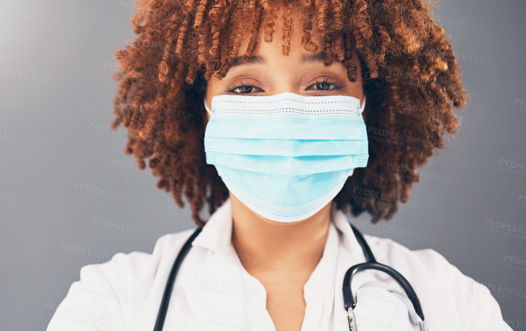 Buy stock photo Portrait, healthcare and black woman with mask, wellness and protection against grey studio background. Face cover, African American female doctor and medical professional with safety regulations