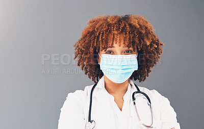 Buy stock photo Portrait, mockup and healthcare with black woman, mask and safety regulations against grey studio background.   Face cover, Jamaican female doctor and medical professional with stethoscope and trust