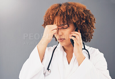 Buy stock photo Woman doctor on phone call stress, headache or anxiety for healthcare problem isolated on gray background. Tired, burnout and medical professional or nurse with pain, frustrated or angry on cellphone