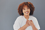 Black woman, portrait and face with hands on chest or heart for love, care and support for charity. Face of African person with hand for gratitude, kindness and trust or thank you on gray background